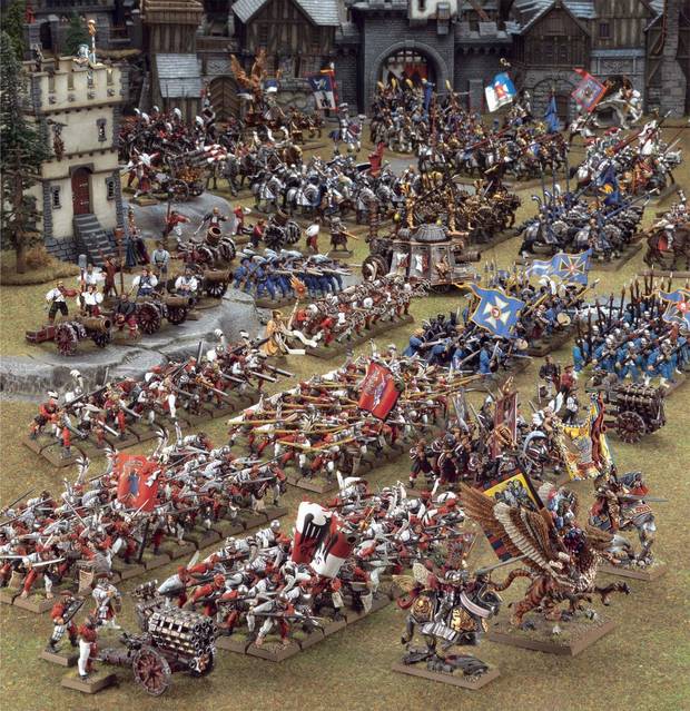 Un ejército bien pintado en completa formación y en un buen campo de batalla lleno de escenografía siempre luce mucho.